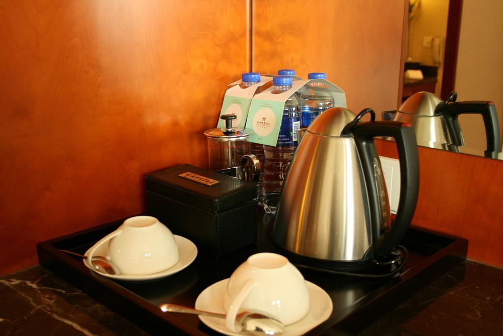 Merryland Traders Hotel Changshu Oda fotoğraf