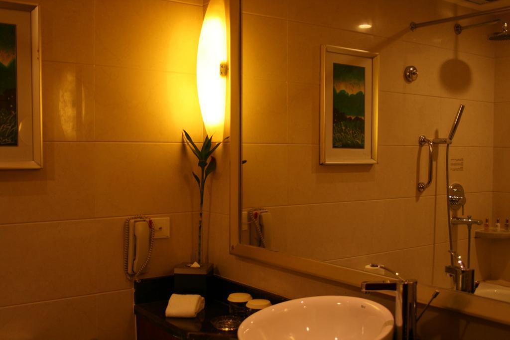 Merryland Traders Hotel Changshu Oda fotoğraf