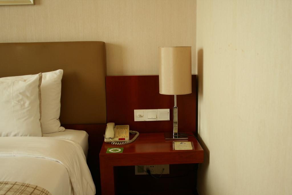 Merryland Traders Hotel Changshu Oda fotoğraf