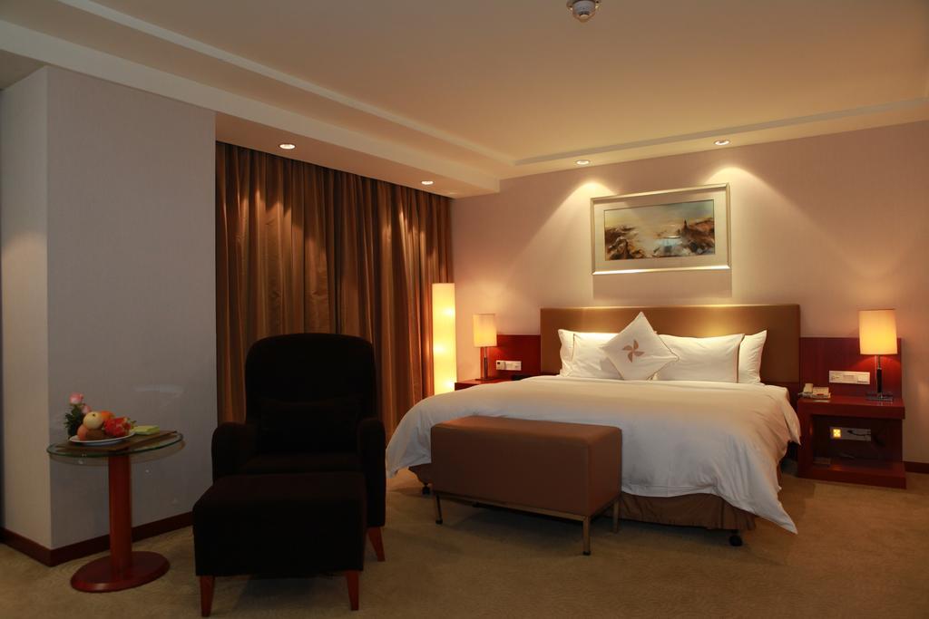 Merryland Traders Hotel Changshu Oda fotoğraf